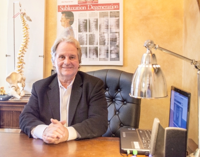 Dr. Michael Posner has 35 years of experience combining his skills as a chiropractor with a variety of other treatment methods to bring relief to patients in Huntington. (Long Islander News photos/Connor Beach)