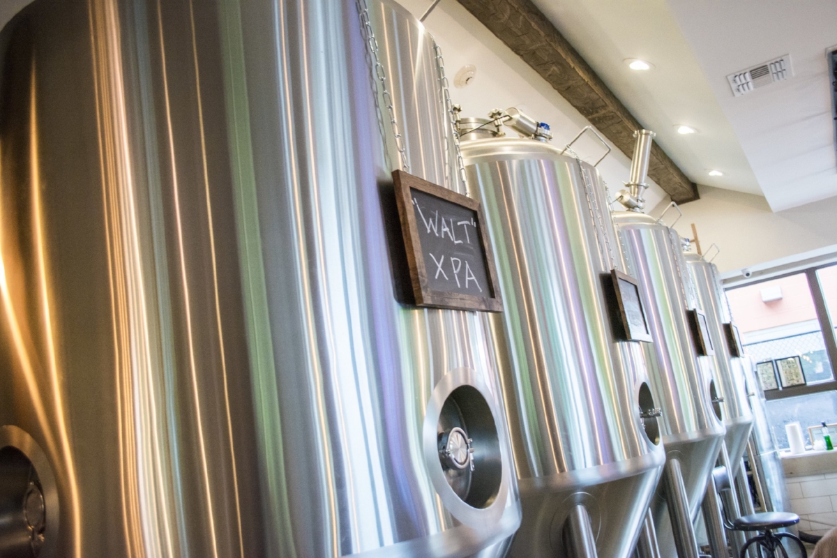   Indicative of the Heuwetters’ front-and-center approach, Six Harbors’ four fermenters serve as the backdrop to the bar area.  