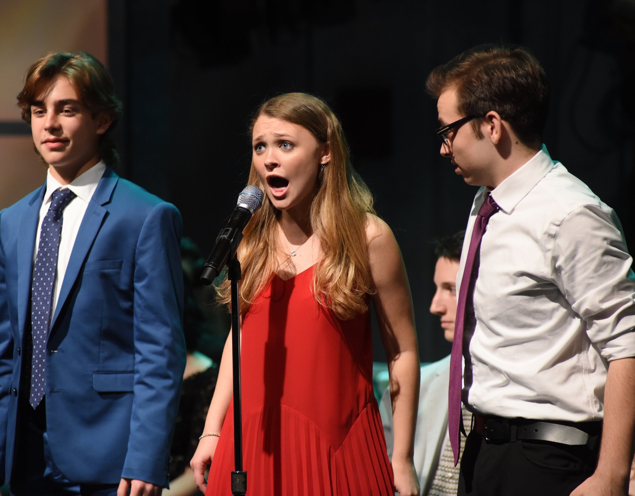   Julia DeVita, center, of Harborfields, won “Best Actress in a Musical “ for her performance in “The 25th Annual Putnam County Spelling Bee.”  