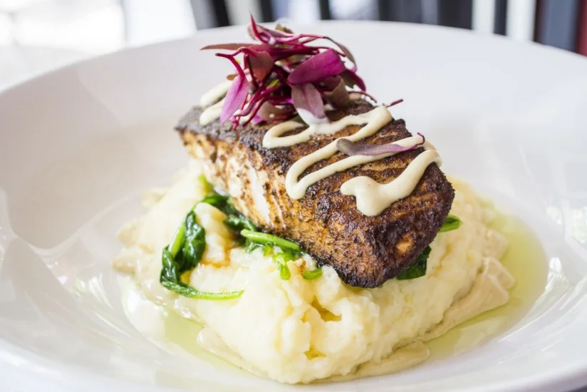   Pan Seared Halibut ($38 or market value) is served with porcini mushroom over sautéed spinach, mashed potatoes and a wasabi aioli.  