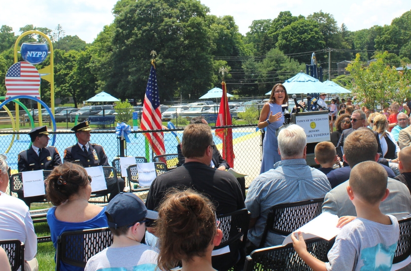   Lisa Tuozzolo addresses the crowd at the grand opening ceremony on Wednesday.  