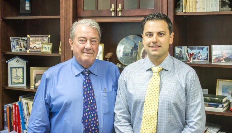 Experienced financial advisor Jon Ten Haagen, left, has partnered with Rick Betancourt, right, and Andrew Hollingsworth, not pictured, to provide continuity for his clients. (Long Islander News photo/Connor Beach)