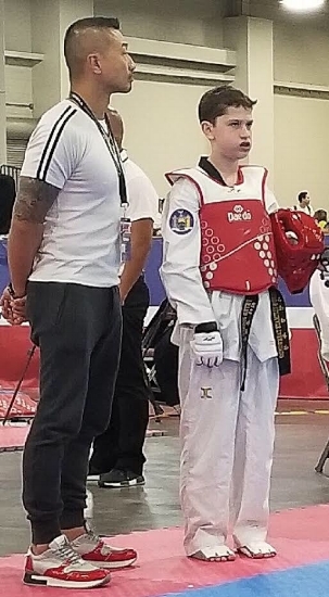 PJ Katcher, right, is pictured at the 2018 USA Taekwondo Nationals held in Salt Lake City earlier this month. (Photo courtesy of Peter Katcher)