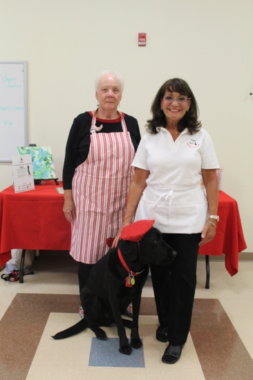   Workshop leaders Ann Barile, left, and Yvonne Dagger, right, with the talented DogVinci.  