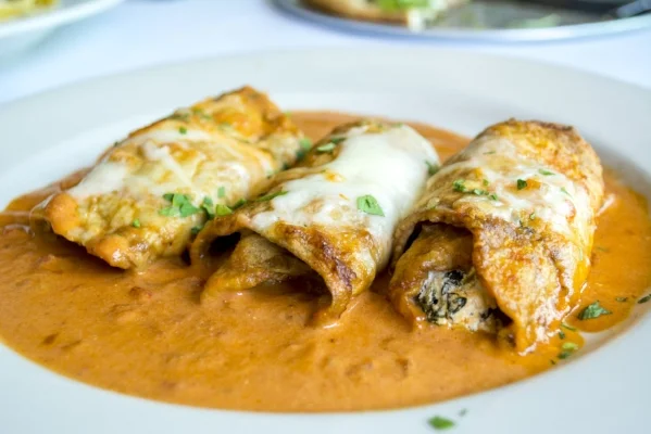   Eggplant Rollatini features eggplant, sundried tomato, spinach, mascarpone and pink champagne sauce, is an option on Eatalia’s $10.99 weekly lunch menu.  