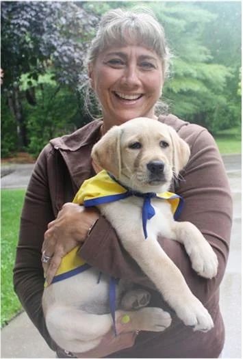 After a service dog was helpful to Cynthia DeStefanos daughter, the Northport mom is starting Orienne, a yellow Lab, a start on a career as a service animal.