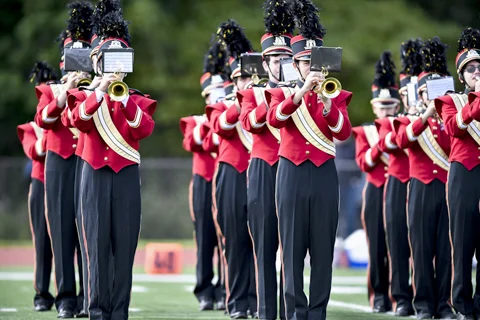  The Northport High School marching band, accompanied by the Flagline and Tigerettes, gave a riveting halftime performance during homecoming. 