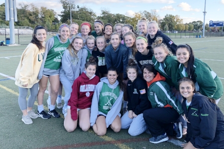 The Harborfields Field Hockey team after their game with USA Women’s National soccer team player Allie Long.