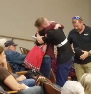 At an event organized to honor service members, two military families were surprised by their sons’ returning after a yearlong deployment.