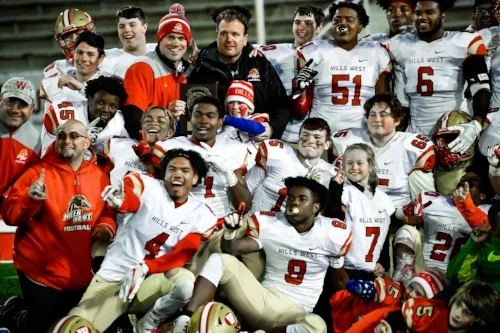 The Colts celebrate victory with their coaches at the Suffolk County Class III championship game Nov. 17. Photo by Phil Orlando
