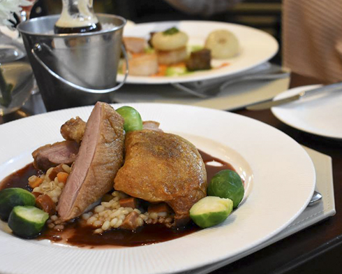 Long Island Duck Duo ($36) served with pearl barley risotto, chorizo, carrots and red wine-port sauce is on the Christmas Eve menu at Sandbar in Cold Spring Harbor.