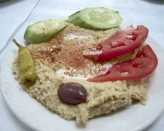 With an array of appetizers that are perfect for sharing, Parea (360 New York Ave., Huntington) is the perfect place to socialize over a plate of hummus. Their hummus ($8.95) comes from ground chickpeas, olive oil, lemon juice, garlic, and tahini served with a side of pita bread. It is the perfect consistency and has a fresh flavor that pairs well with the bread or on meats.