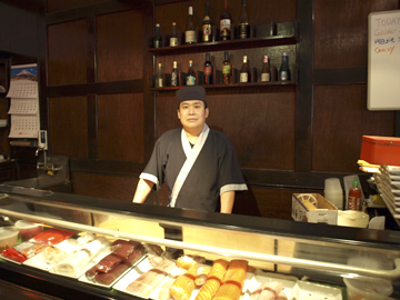  Sushi chef Jason He oversee the fish preparation at Hikudo.     