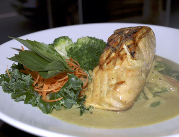  Salmon with Green Curry ($21) is rich with flavors of basil, coconut milk and Chef Marki’s ‘secret ingredient.’ 