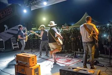 Huntington-based Gnarly Karma,playing the Great South Bay Music Festival, above, will play to the home crowd when they open for TR3 at The Paramount on Feb. 1.