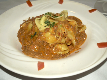   Pappardelle Bolognese  with freshmade pasta and a rich, meaty sauce.   