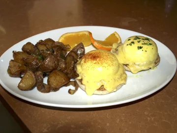  Eggs Benedict are a favorite on the brunch menu.     