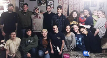 Students for 60,000 gave their time to paint the homes of three families, who had all been impacted by the opioid epidemic.