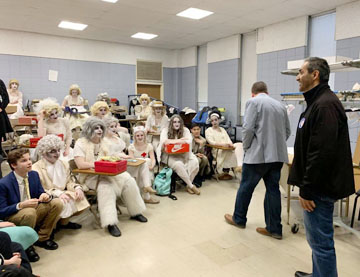 “The Green Sheikh,” Abdul Aziz Al Nuaimi, a member of the United Arab Emirates’’ royal family, speaks with St. Anthony’s theater company cast members about youth empowerment and environmental issues.