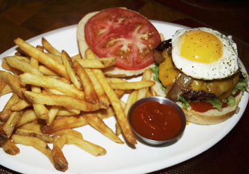  IMC’s Brunch Burger proves everything’s better with bacon… and an egg. 