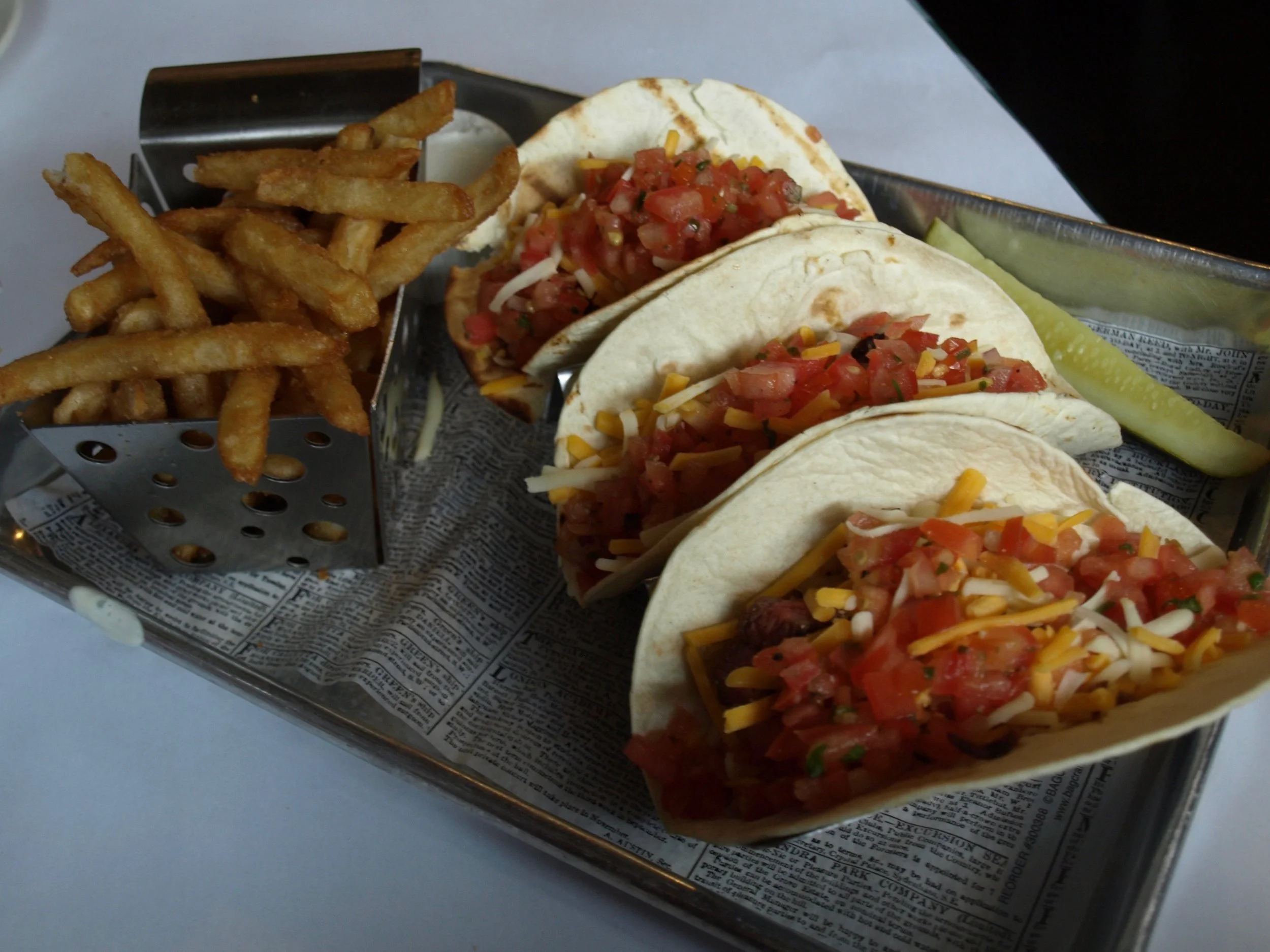  Carne asada tacos with marinated steak, jack cheese, salsa fresca and cilantro . 