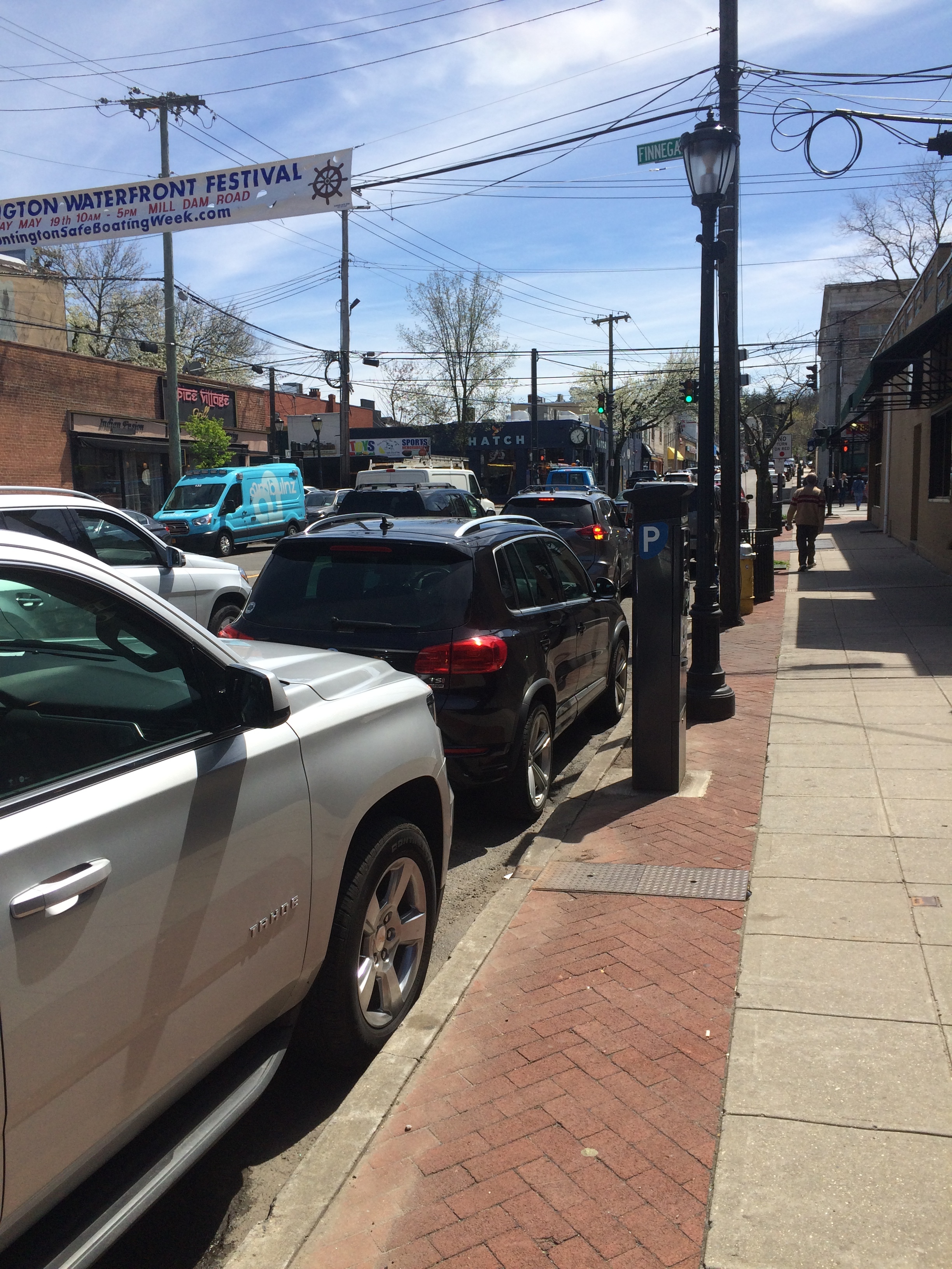 Cars parked on Wall Street near the intersection with Main Street in Huntington village. The town board voted Tuesday to increase parking fees on side streets in the village. Long Islander News photo/Connor Beach