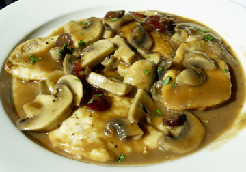 Chicken marsala with mushrooms, cranberries and wine sauce