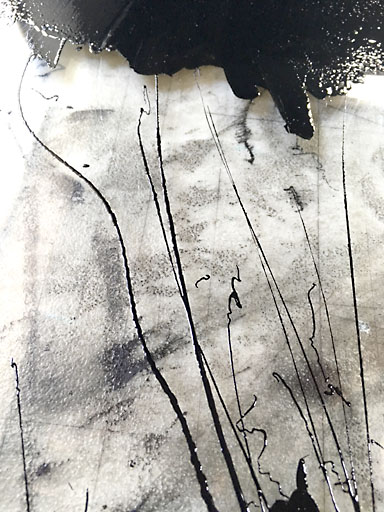  Ink dribbles and brayer marks give Lyle’s work area the feel of an abstract piece. 