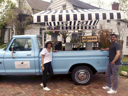 Jaclyn Rutigliano and Marc Iervolino deliver and sell flowers from the back of their pickup truck “Baby Blue.” Long Islander News Photo/Sophia Ricco