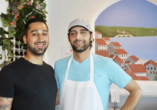 Owner Edmund Zarou, left, has kept Zaro’s Cafe a family tradition taking over the business after 25 years. Cousin Alex Solounias is the restaurant’s chef and grillmaster.