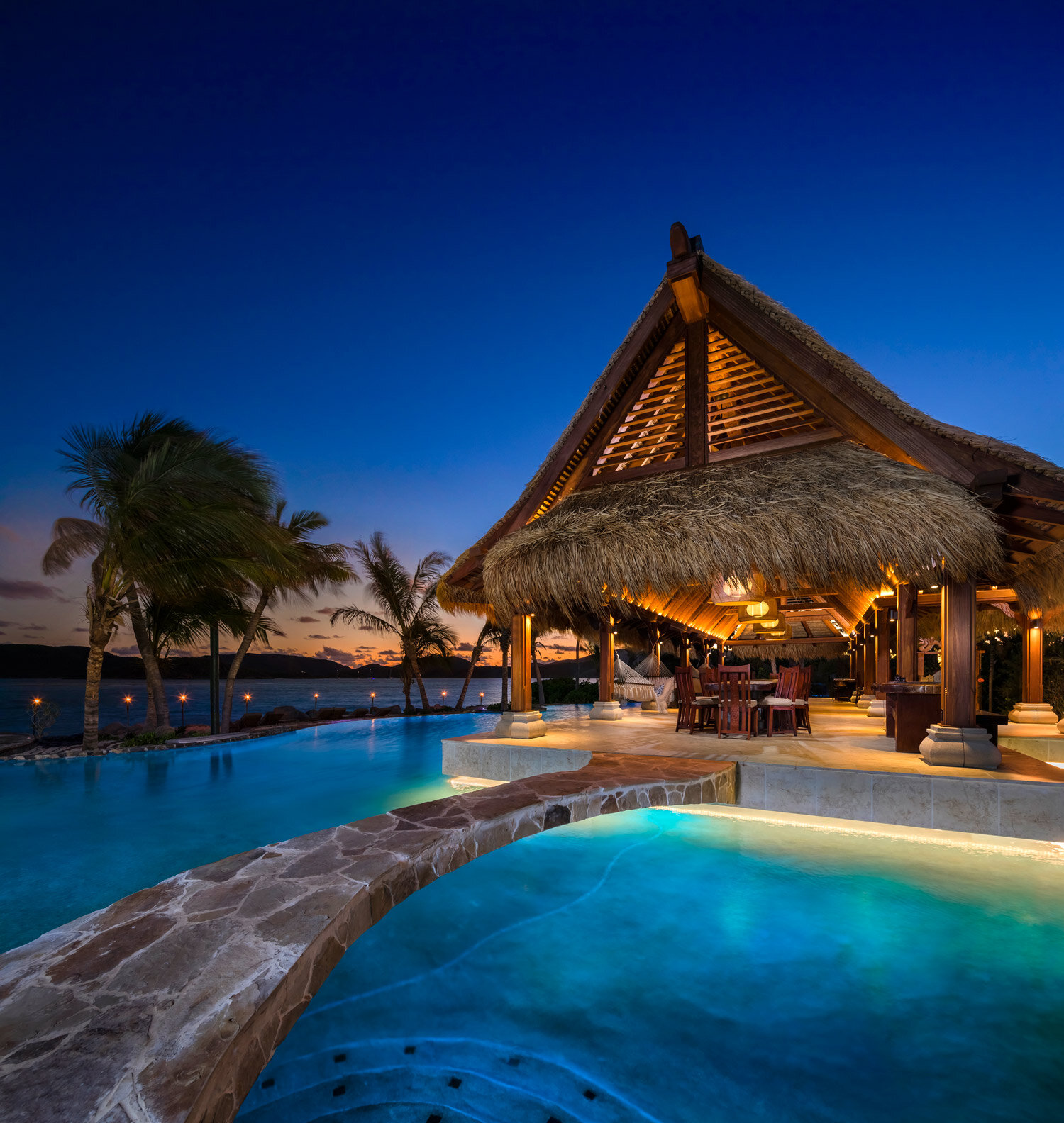 dinner-setup-on-necker-island-around-the-pool