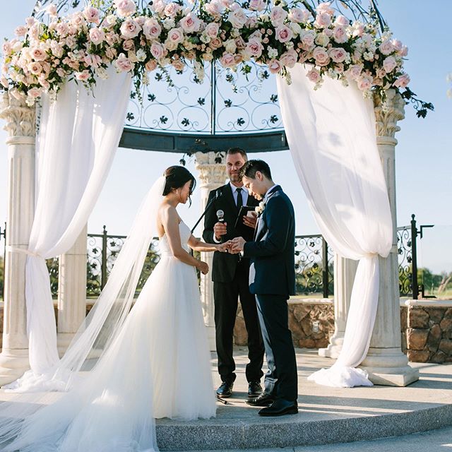 Exchanging promises and vows in stunning Seal Beach venue. 
#wedding #ocwedding #weddingdress #weddingwire #orangecountywedding #vows #rings #weddingphotography