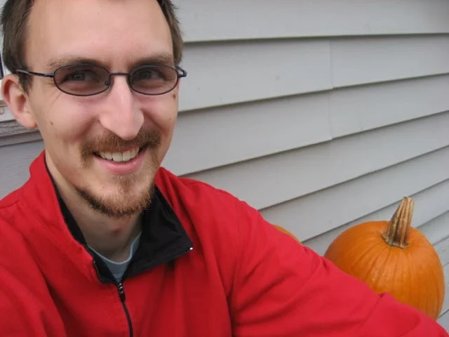 Winner Hangs with Pumpkin