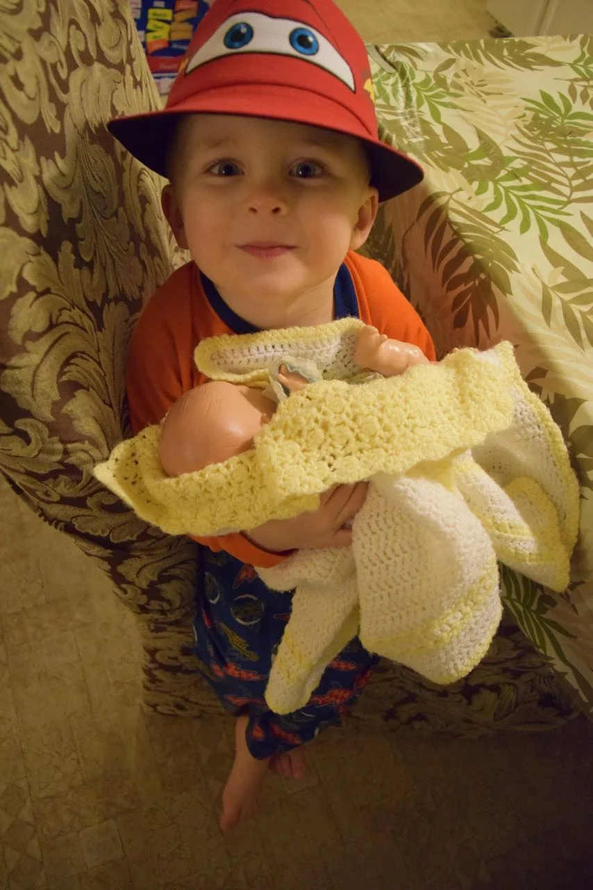 T with Birthday Hat and Baby