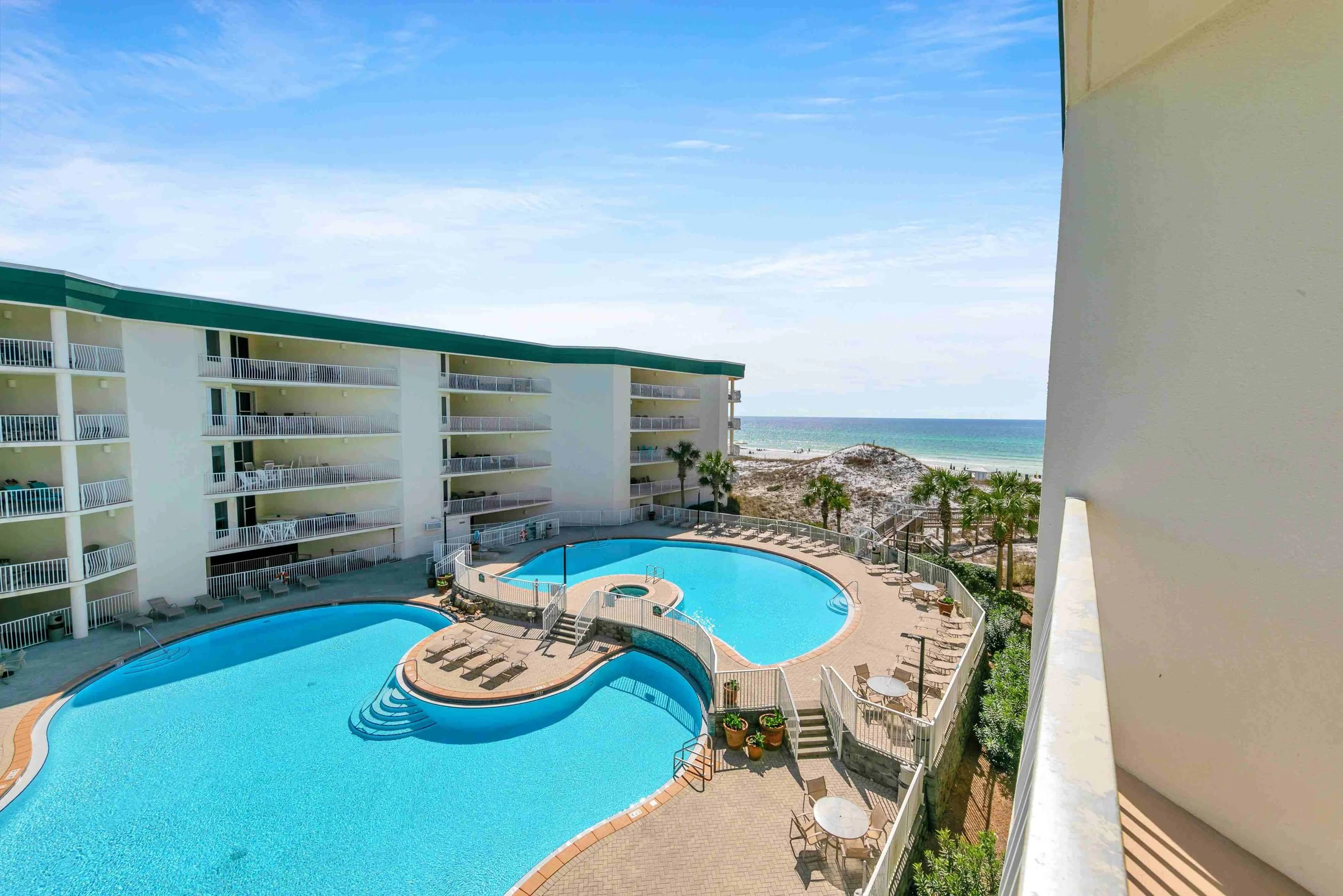 VIEW OF POOL & BEACH FROM BALCONY