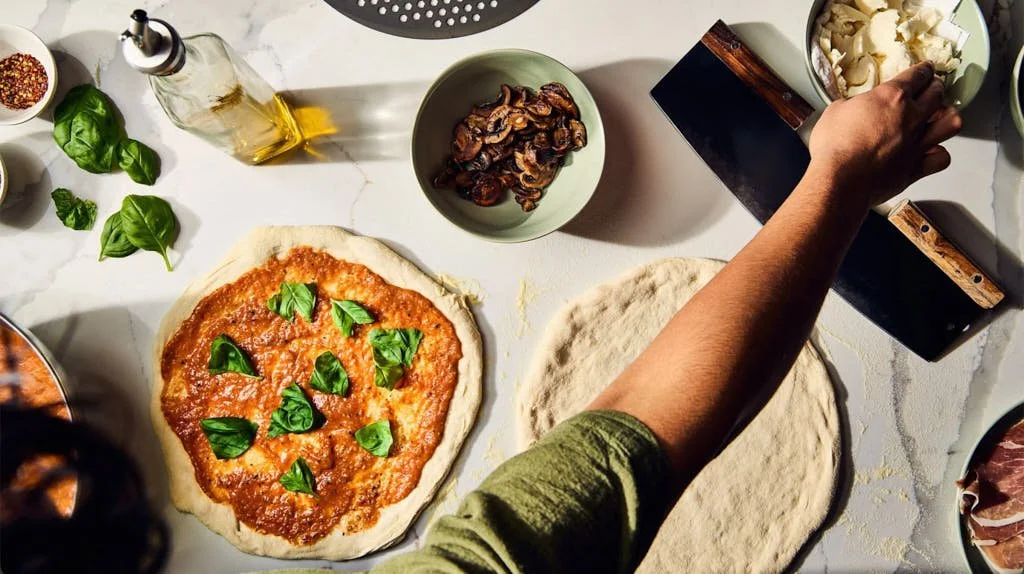 overhead shot of pizza being made Lifestyle Photography Victoria BC.jpg