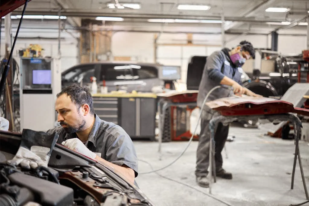WORKPLACE-PHOTOGRAPHY TWO AUTOBODY WORKERS.jpg