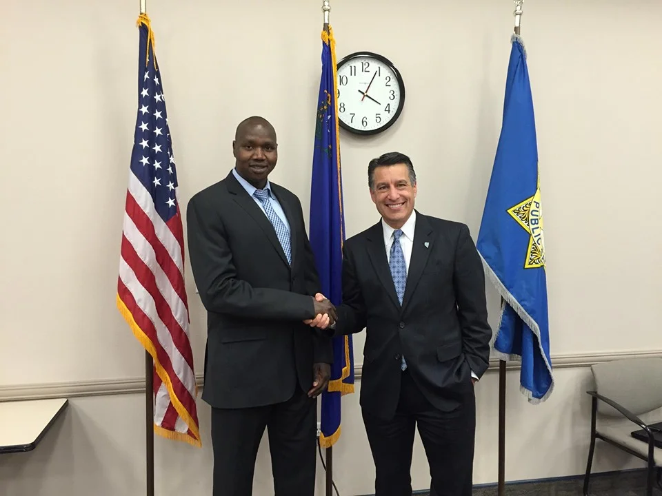 With Nevada Governor, Brian Sandoval. Biar shared his story at the Nevada Commission on Homeland Security Meeting. 12.2.15