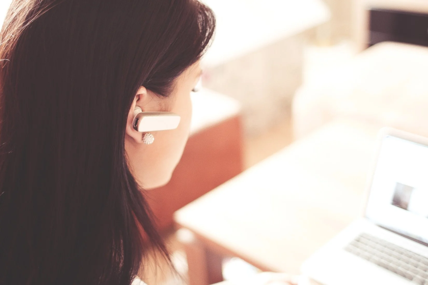 Woman on bluetooth phone_picjumbo Pexels compressed.jpg