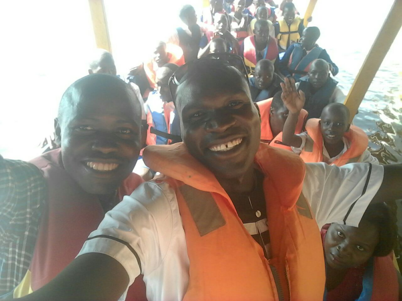 Teachers and pupils on a boat trip down The River Nile. Most of these children will have never been on a boat before.
