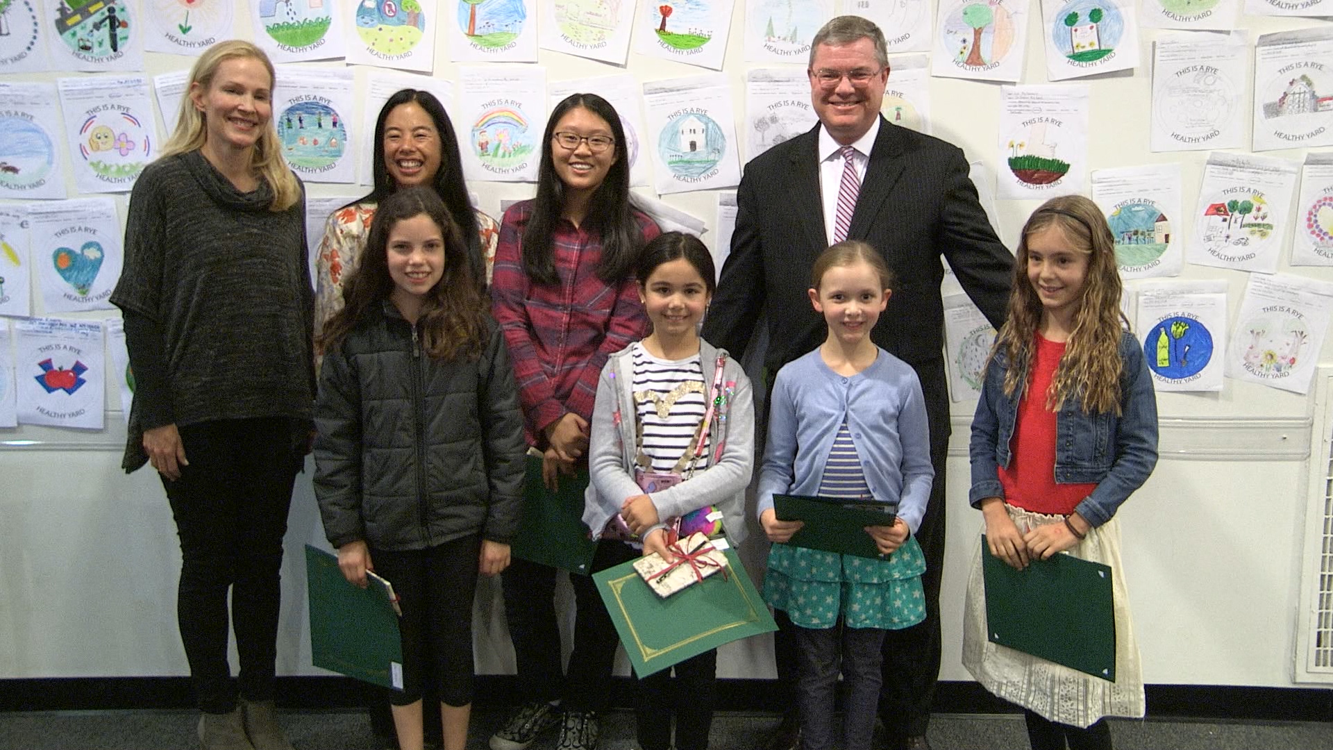 Contest winners Reese Wolfe, Charlotte Lee, Julia Zanolin, Liv McNamara and Mattia Gibbs, with RSC chair Sara Goddard, Rye Arts Center board member Jen Sandling and Mayor Sack.