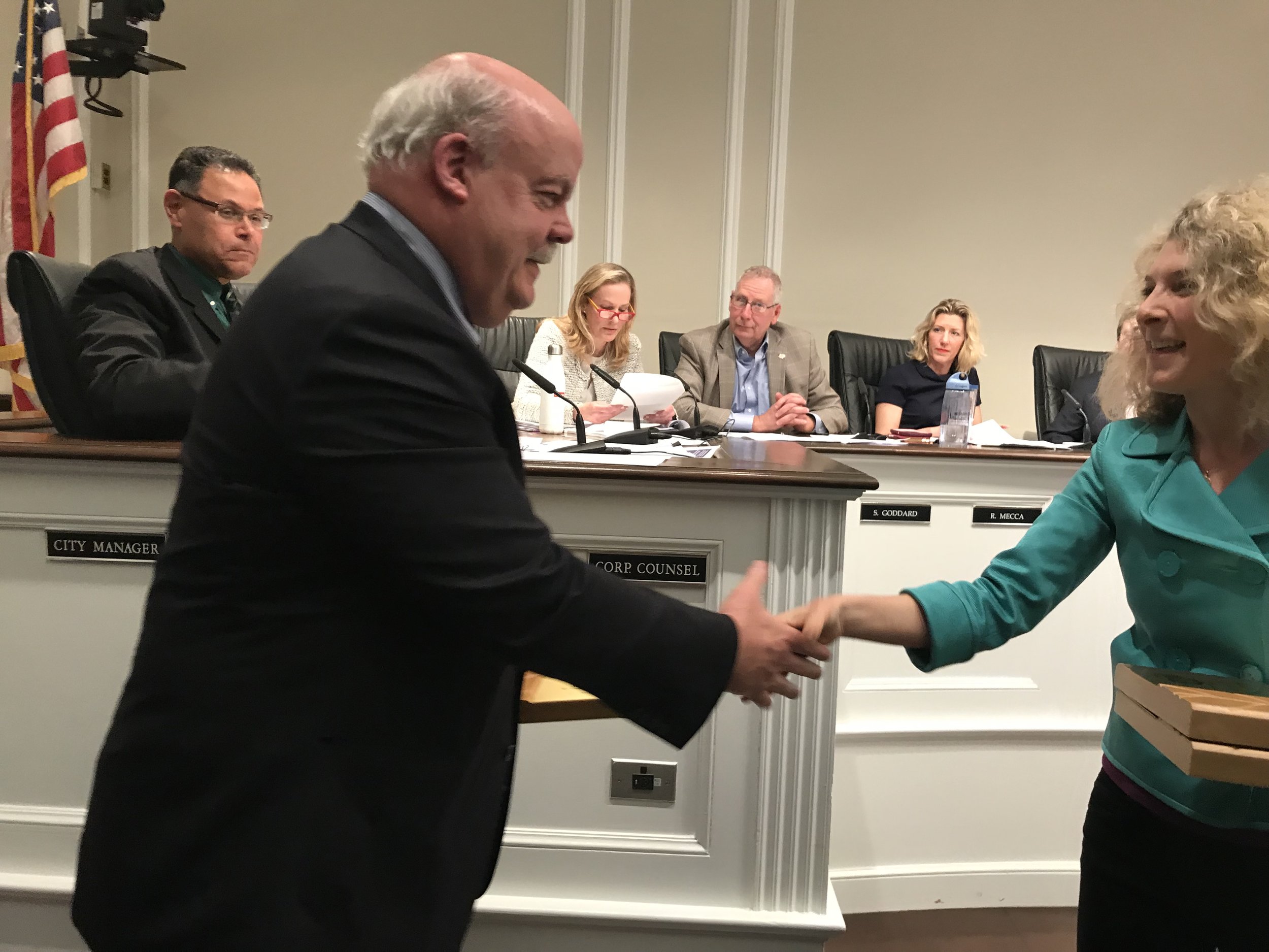 RCDS Headmaster Scott Nelson receives his award from RSC Chair Melissa Grieco.