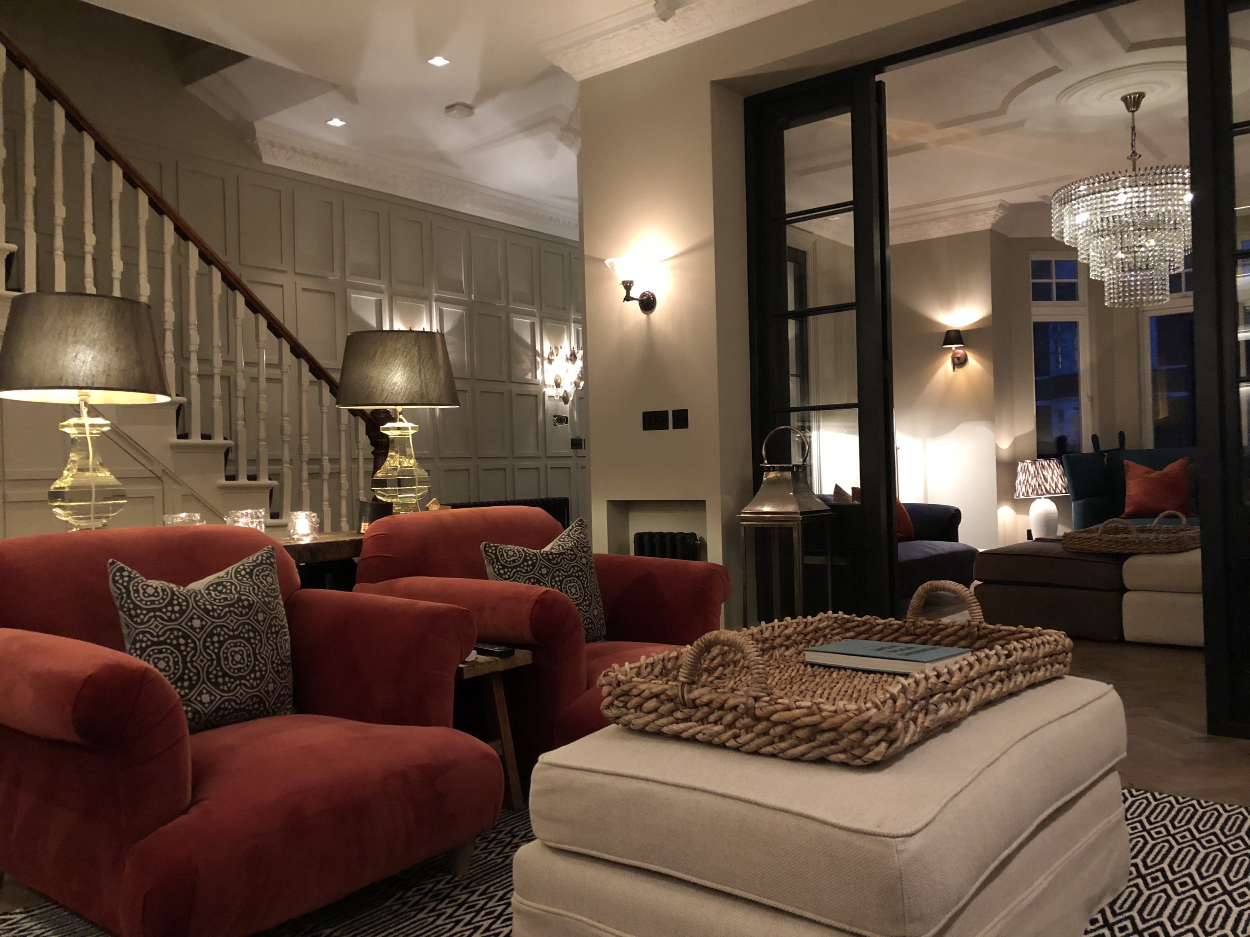 Open plan living room, with sprinkler system to comply with building regulations. Structural openings formed between front and rear reception rooms, New sash windows to the side elevation. Underfloor heating below herringbone parquet engineered oak flooring.