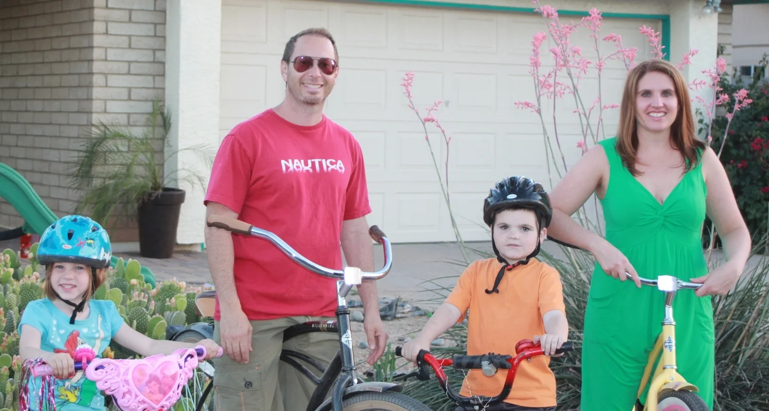 I'm riding my bike with my family!