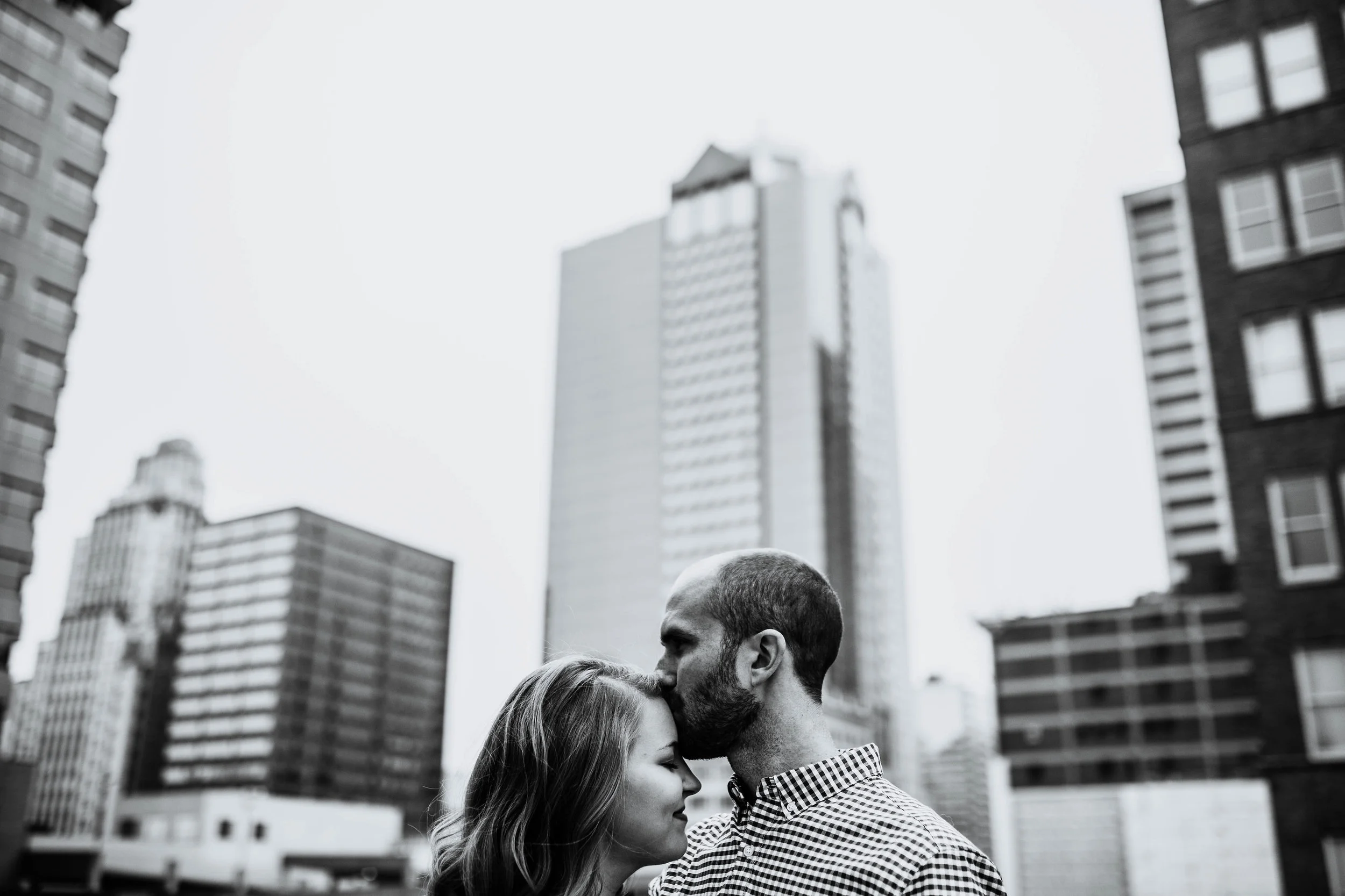 Alex & John: Downtown KC Engagement Session | Hannahill Photography | Kansas City, Mo | rooftop library session urban brick walls | engaged | couples portraits | wedding photographer | lifestyle photographer | documentary love story photographer