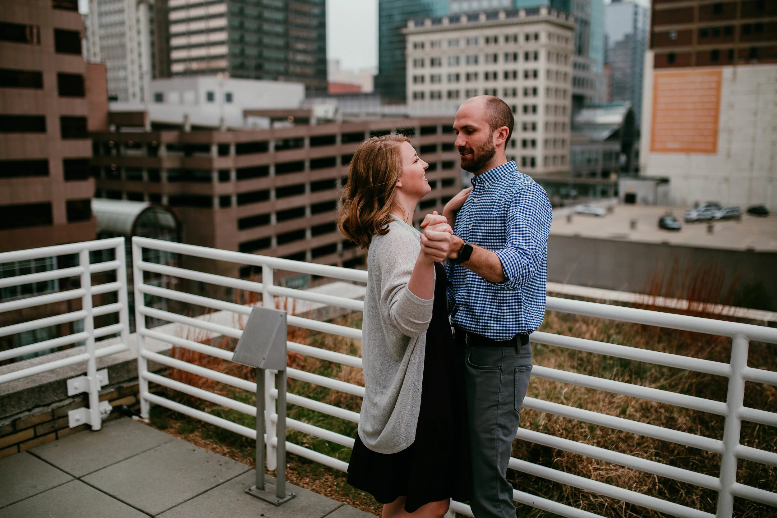 Alex & John: Downtown KC Engagement Session | Hannahill Photography | Kansas City, Mo | rooftop library session urban brick walls | engaged | couples portraits | wedding photographer | lifestyle photographer | documentary love story photographer