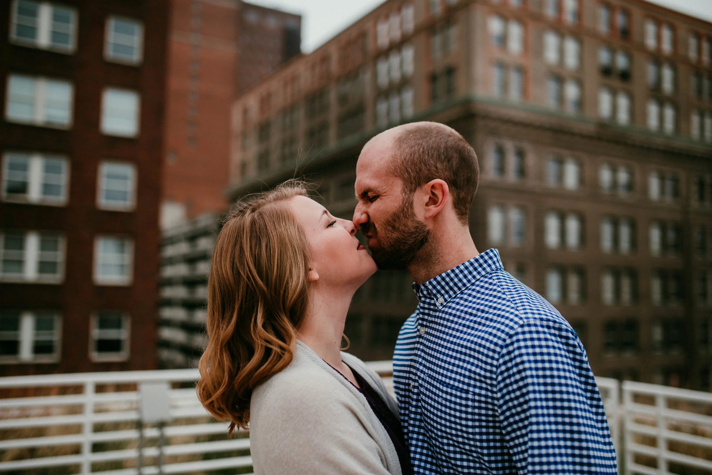 Alex & John: Downtown KC Engagement Session | Hannahill Photography | Kansas City, Mo | rooftop library session urban brick walls | engaged | couples portraits | wedding photographer | lifestyle photographer | documentary love story photographer