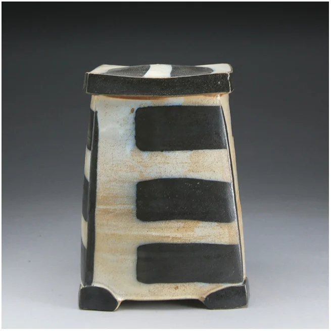 "lidded Persian jar"