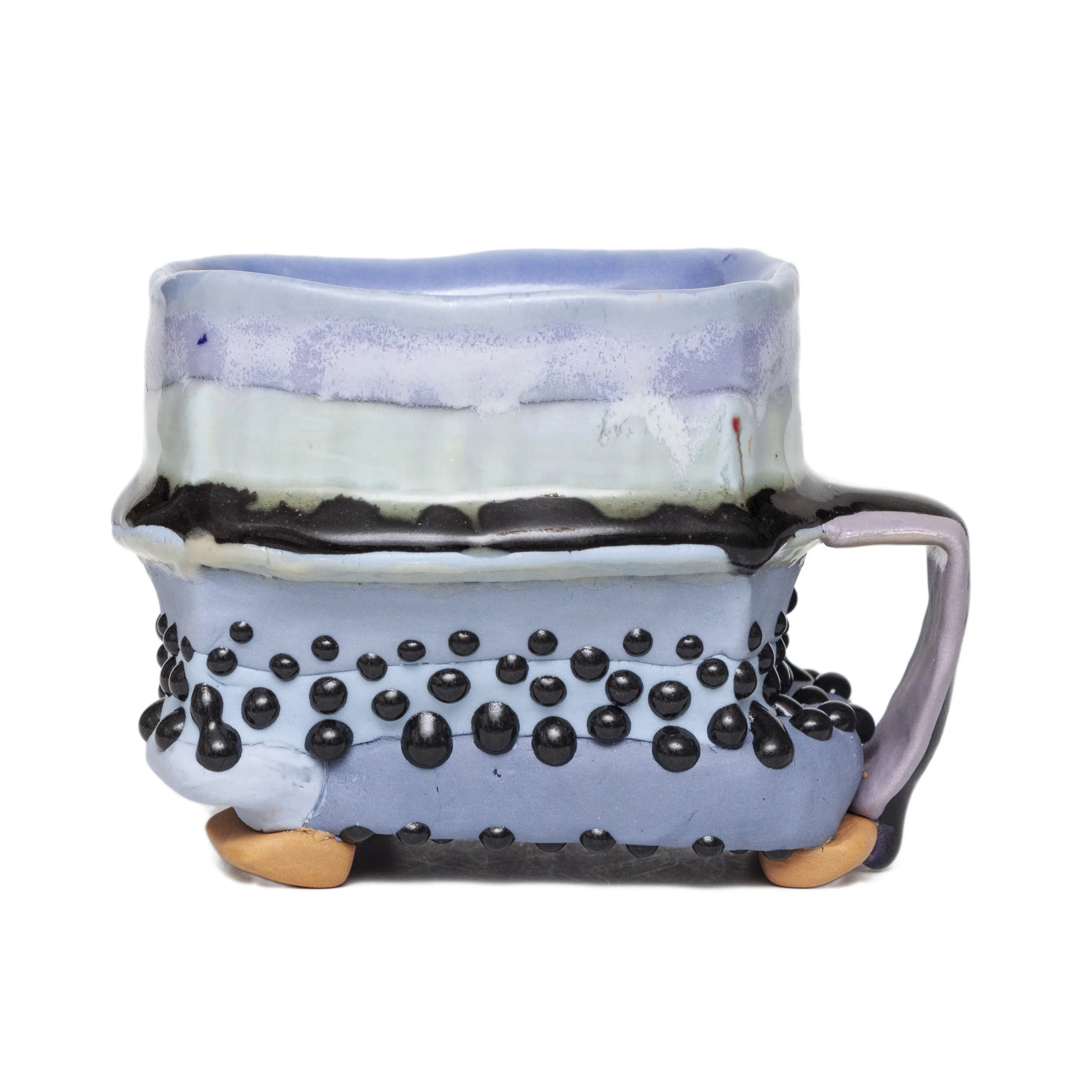   Seer Skier   SOLD  colored porcelain and glazes, cone 11 oxidation 4 x 3.5 x 5" 2018 