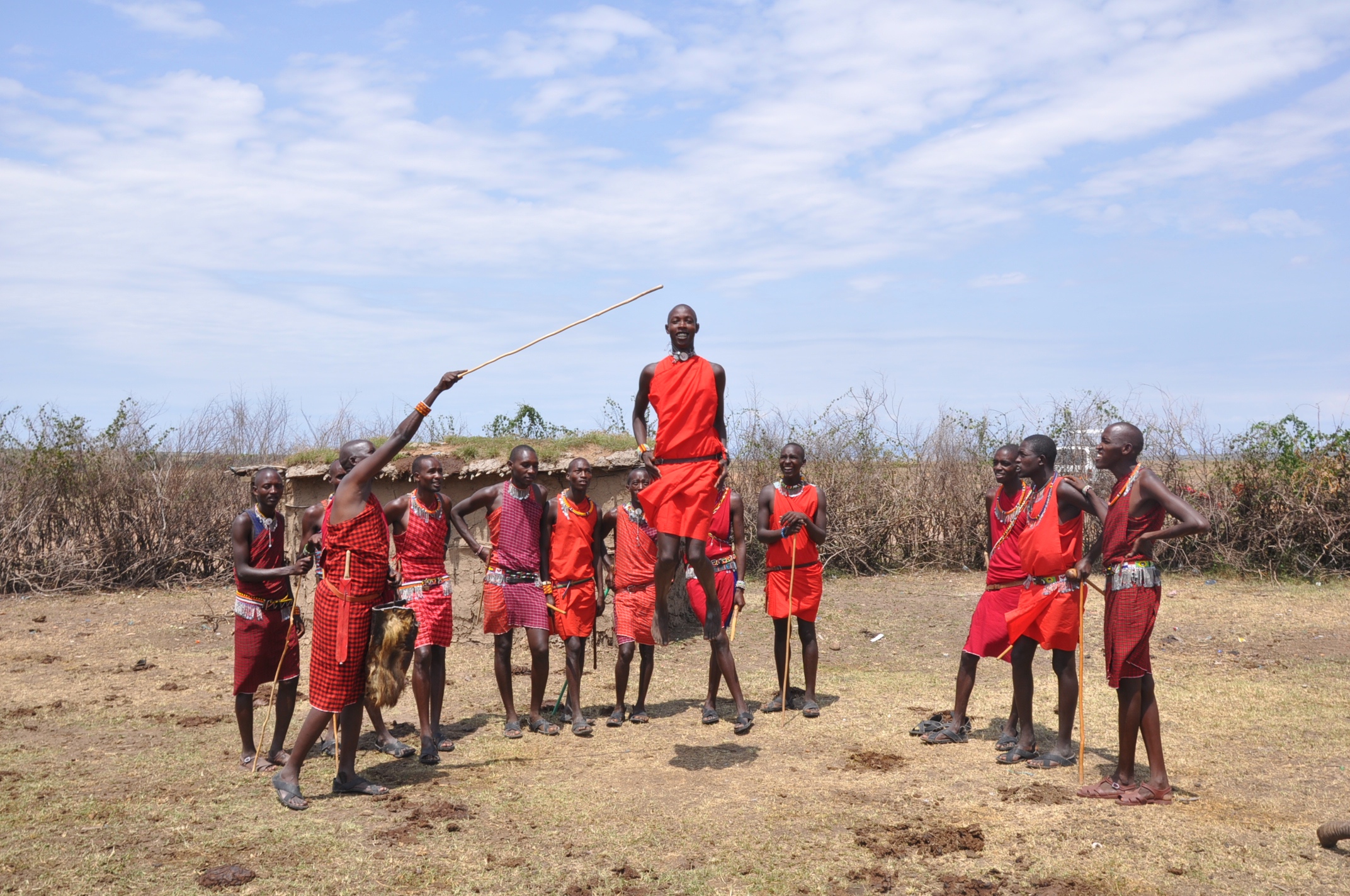  Day 4: We spent the afternoon in a traditional Masai village near our camp. The   Masai  &nbsp;are a semi-nomatic people inhabiting Kenya and Tanzania, known for their patterns, beadwork and&nbsp;ferocity. Patrick (jumper), walks over 12 miles throu
